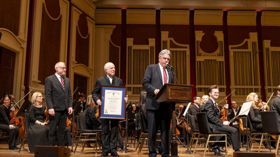 Three men on stage at Heinz Hall