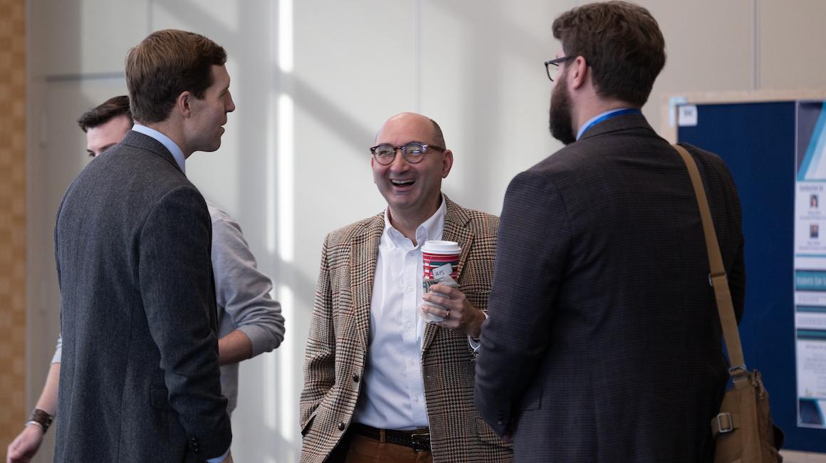 Connor Lamb speaks with conference attendees