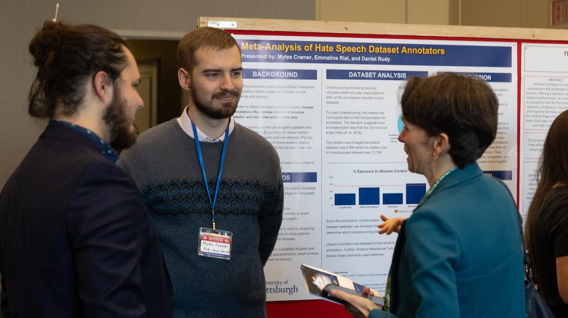 Students, faculty at poster presentation