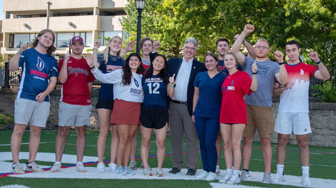 Duquesne University President Ken Gormley with student club sports leaders