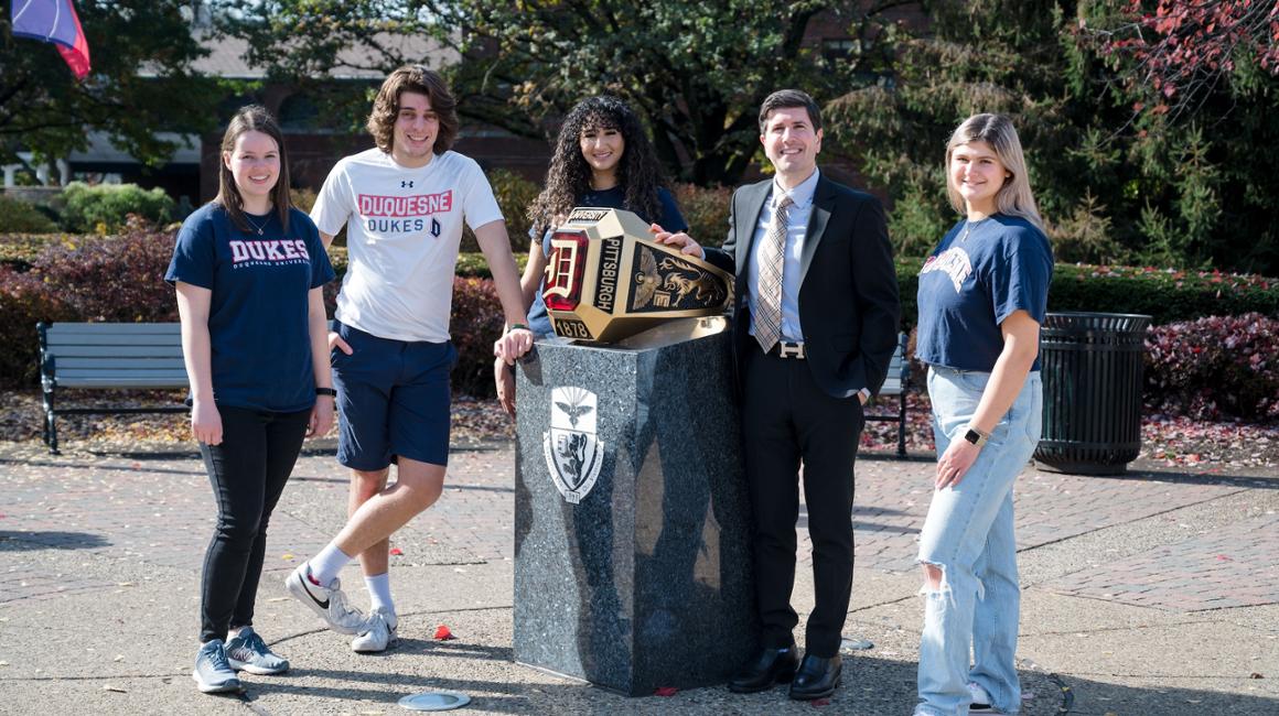 Duquesne students and Dr. David Dausey on campus