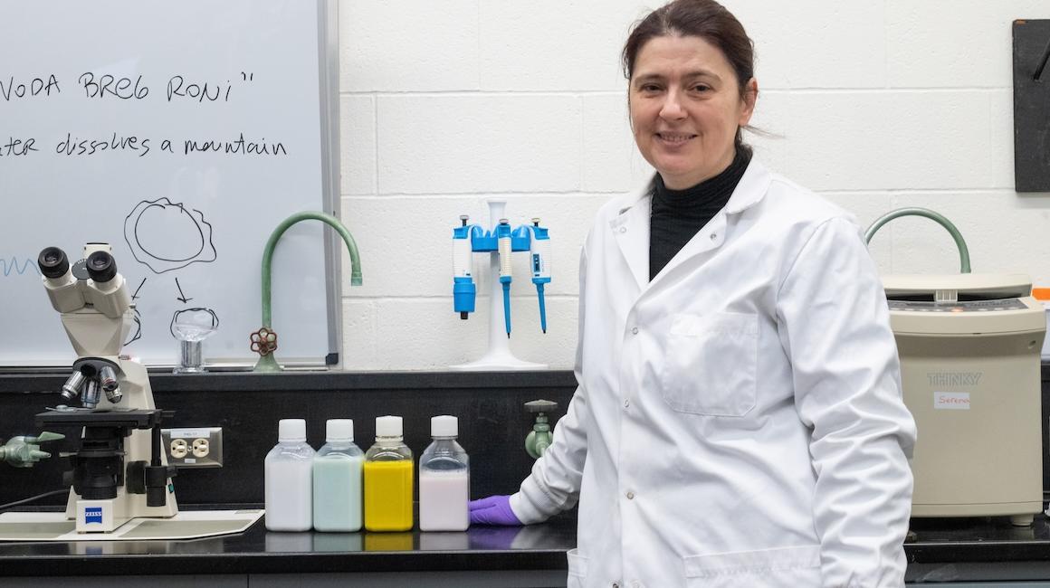 Dr. Janjic with bottles of nanomedicine 