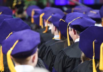 Law graduates in robes and caps