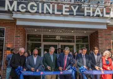 Duquesne leadership cut the ribbon at McGinley Hall.