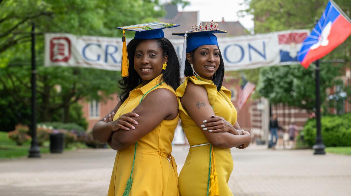 Alysia McCray and Candis McCray, sisters, on commencement day