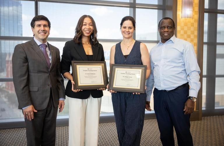 Faculty posing with their creative teaching awards.