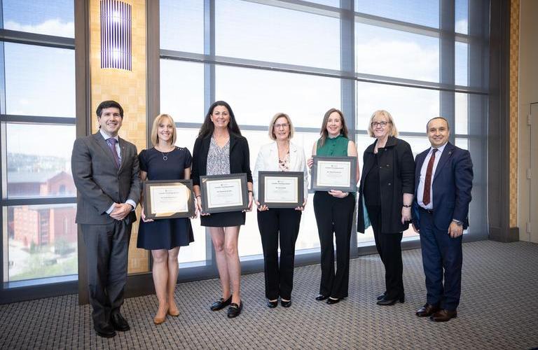 Faculty posing with their creative teaching awards.