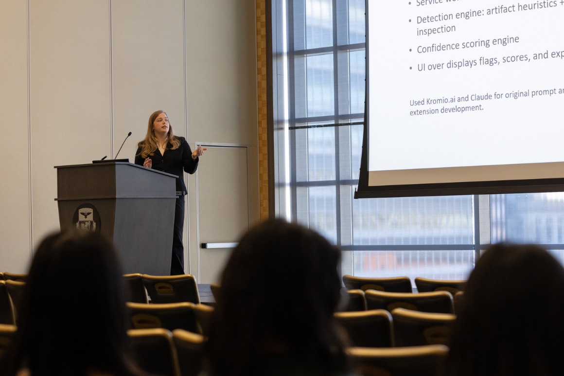 a student presents her project on stage at Hacking4Humanity 2026