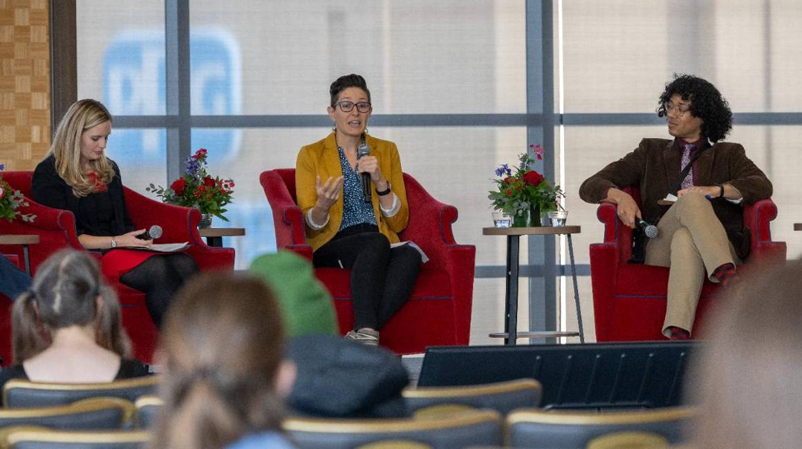 three panelists discuss AI and education on stage at the 2025 tech ethics symposium