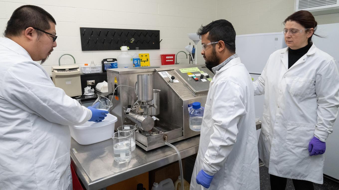 students and Dr. Janjic in lab