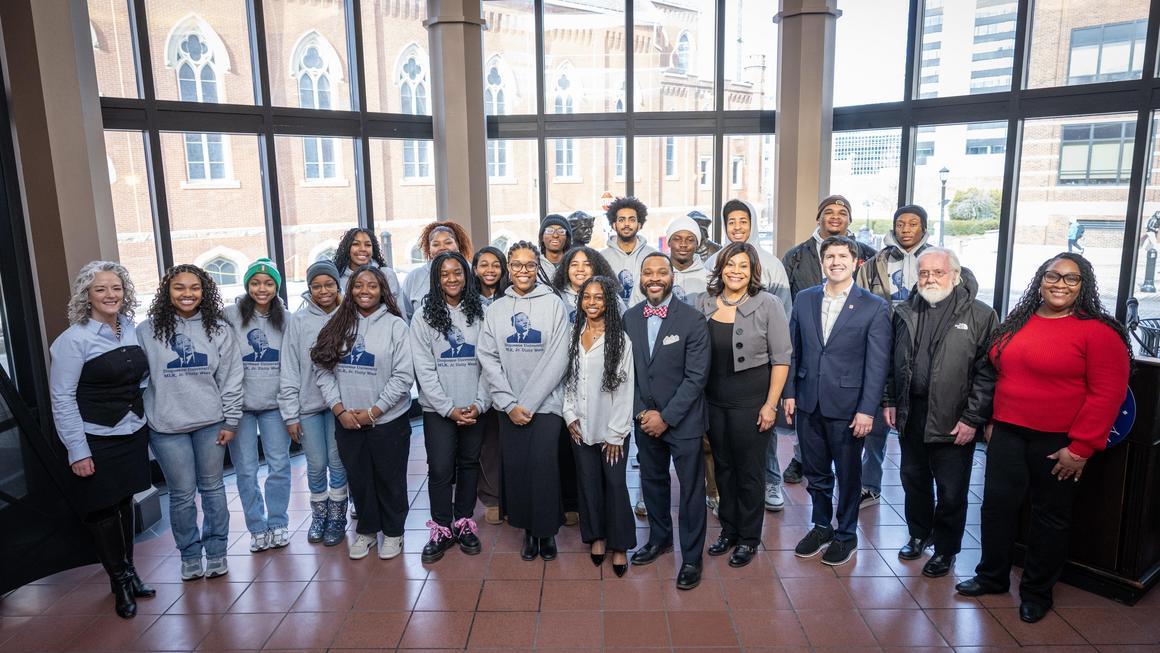 Group photo in the Bayer Rotunda at the MLK Unity Walk 2026 program